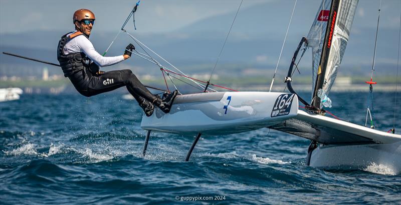 Local Hero Dave Shaw, NZL 270, could be hoping home advantage pushes him over the line in the Open fleet, after being 2nd at Weymouth 2019 photo copyright Gordon Upton / www.guppypix.com taken at Milford Cruising Club and featuring the A Class Catamaran class