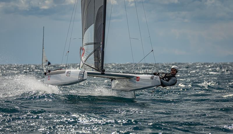 Darren Bundock, AUS 88, comes in fresh from his F18 Worlds win and will be keen to finally add the A-Cat crown to his bulging trophy cabinet photo copyright Gordon Upton / www.guppypix.com taken at Milford Cruising Club and featuring the A Class Catamaran class