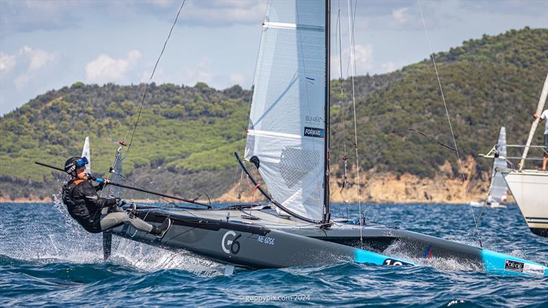 Scheurer Team sailor and Swiss Champ Robin Maeder, SUI 7 is sailing a Classic this time, with the latest foil designs photo copyright Gordon Upton / www.guppypix.com taken at Milford Cruising Club and featuring the A Class Catamaran class