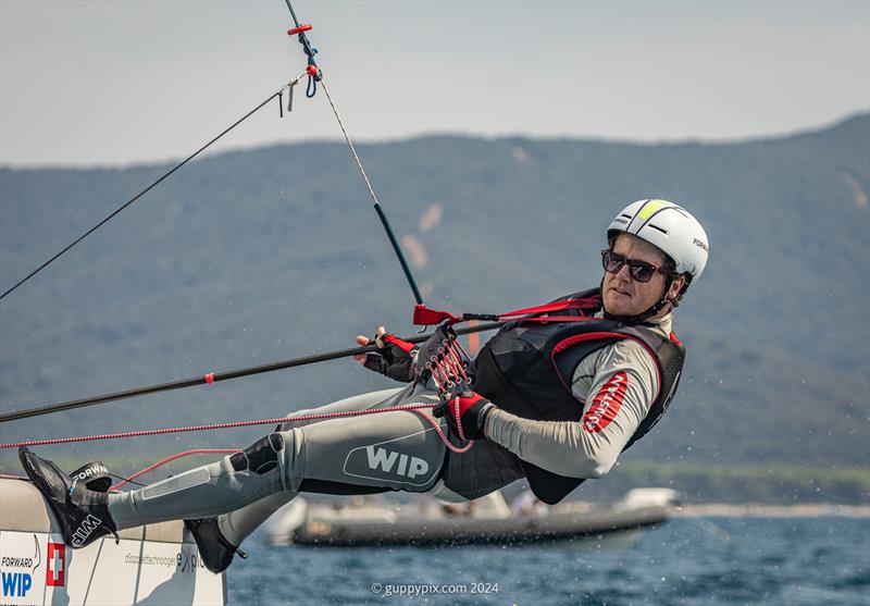 Stevie Brewin, AUS 4, is a 3 times World Champ and will be looking for any weakness in his rivals game in the Open Category photo copyright Gordon Upton / www.guppypix.com taken at Milford Cruising Club and featuring the A Class Catamaran class