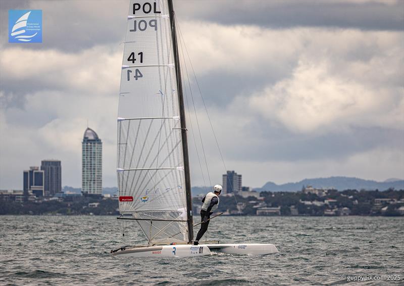 PredictWind A-Class Cat Worlds 2025 - Kuba Surowiec POL 41 searches for that illusive wind advantage in Race two - photo © Gordon Upton / www.guppypix.com