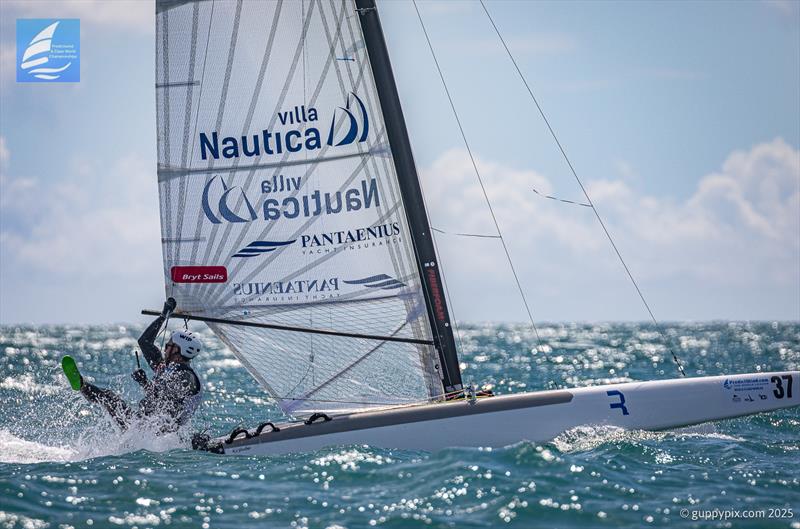 PredictWind A-Class Cat Worlds 2025 Day 4 - Micheal Korneszczukl reassessing his life choices at the top mark photo copyright Gordon Upton / www.guppypix.com taken at Milford Cruising Club and featuring the A Class Catamaran class
