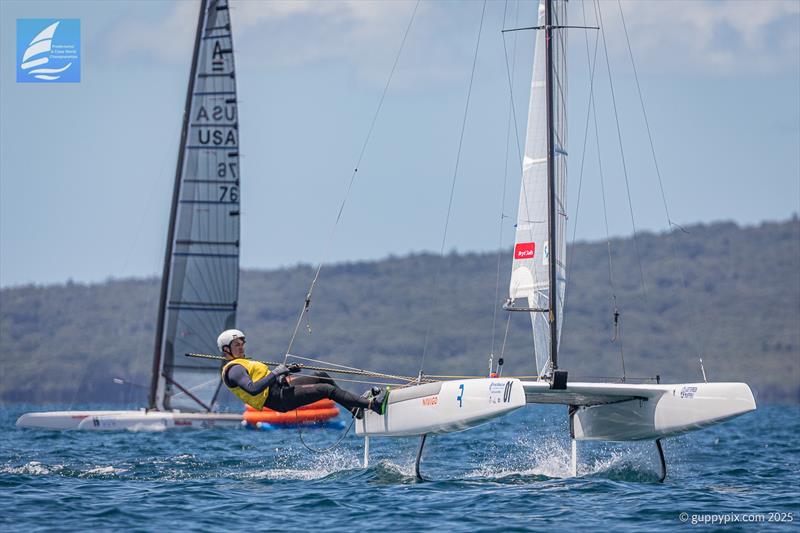 Kuba leads Ravi in the first race .- Day 5 Predictwind A-Class Catamaran World Championships - Milford, NZ - November 16, 2025 photo copyright Gordon Upton / www.guppypix.com taken at Milford Cruising Club and featuring the A Class Catamaran class