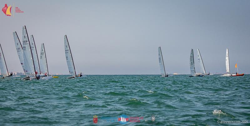 Resized - Open Race 3 start. Far right is Kuba Surowiec POL 41, on his superbly timed port flyer start, giving him a near 100m lead at the top mark on that lap photo copyright Gordon Upton / www.guppypix.com taken at  and featuring the A Class Catamaran class