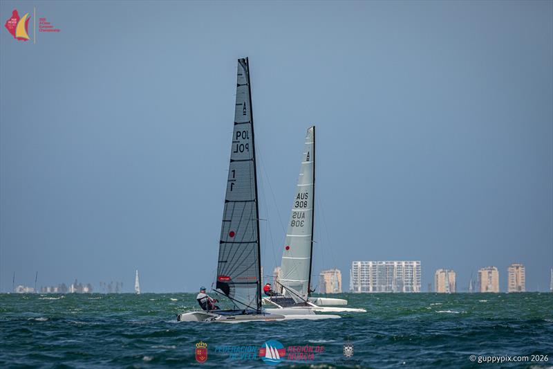 A Class Catamaran Europeans Day 3 - Andrew Landnberger AUS 308 beat leader Jacek Noetzel POL 1 in three races photo copyright Gordon Upton / www.guppypix.com taken at  and featuring the A Class Catamaran class