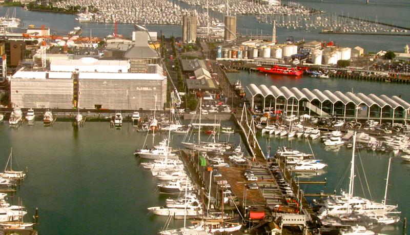 Emirates Team New Zealand will be moving into the Viaduct Events Centre on the right. The NYYC and RYS bases will be located where the white tanks are in the background. Wynyard Wharf has the red ferry tied up to it photo copyright Take a Break webcam taken at New York Yacht Club and featuring the ACC class