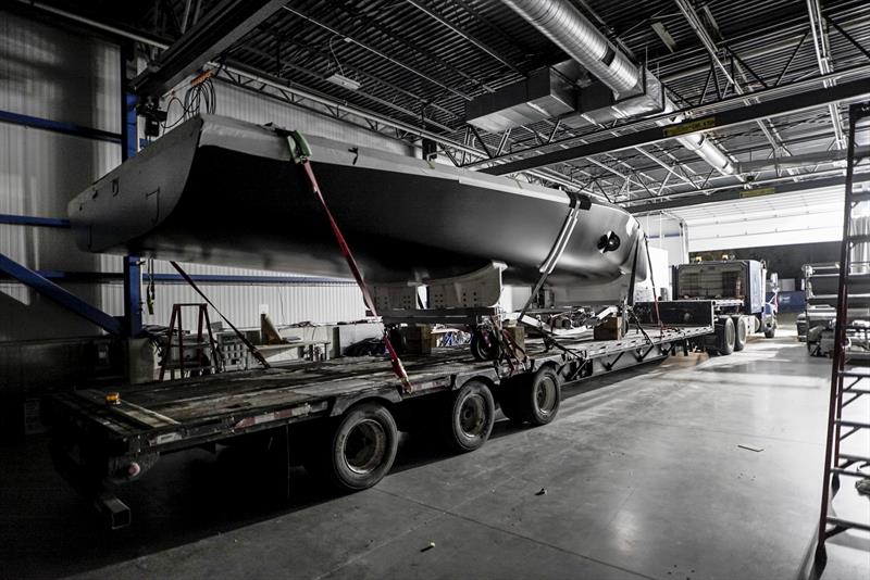  `The Mule` American Magic's surrogate boat exits the building facility - photo © Amory Ross