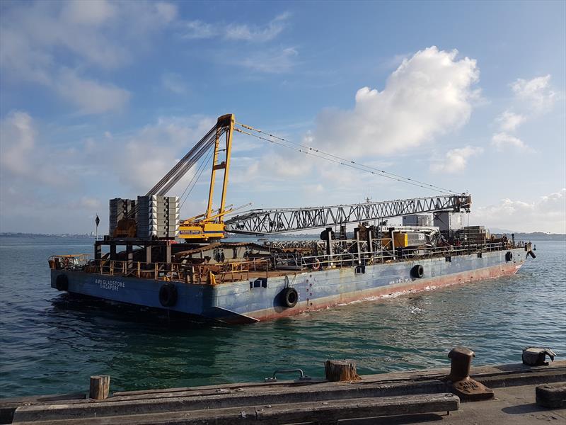 Our barge has arrived at Halsey Wharf here in Tamaki Makaurau. At 63 metres long, with a 400-tonne crane sitting on top of it, it's one of the largest pieces of equipment for our project. Now that it's here, we'll be able to get started building the Hobso photo copyright Wynyard Edge - Panuku Developments taken at Royal New Zealand Yacht Squadron and featuring the ACC class
