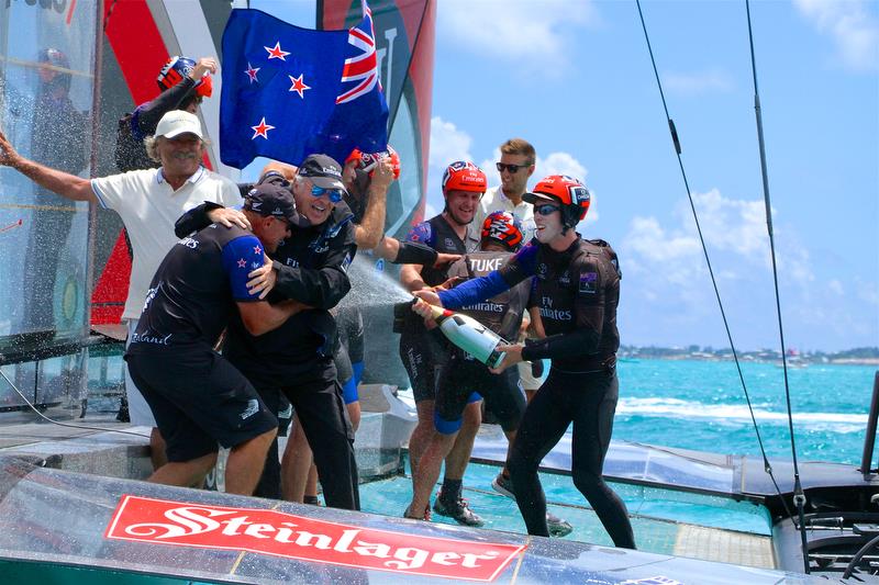 Emirates Team New Zealand celebrate another America's Cup victory under the Steinlager sponsorship photo copyright Richard Gladwell taken at Royal Bermuda Yacht Club and featuring the ACC class