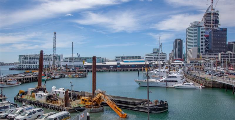Dredge and barge at work in Viaduct Harbour - 36th America's Cup, Auckland, New Zealand photo copyright America's Cup Media taken at Royal New Zealand Yacht Squadron and featuring the ACC class