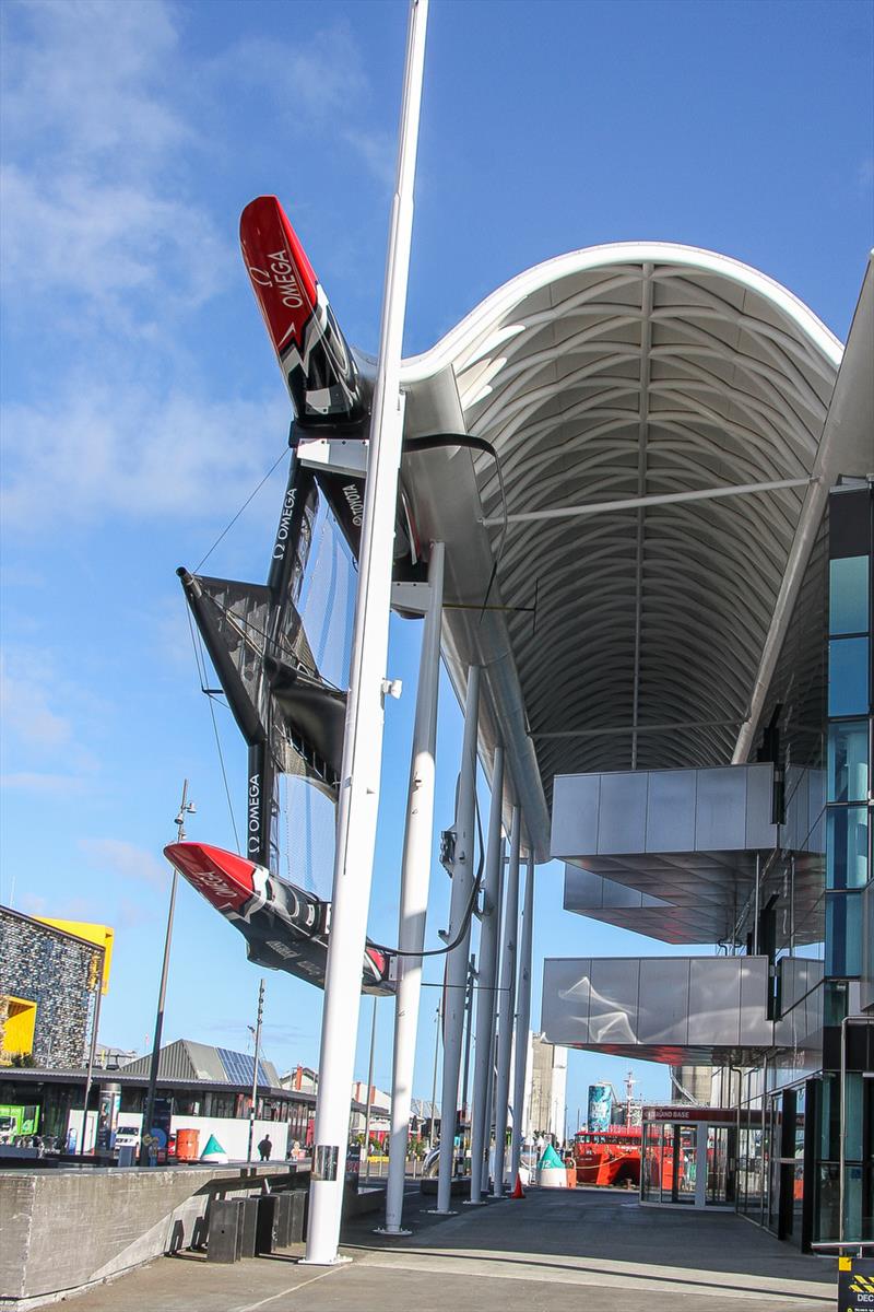 Emirates Team New Zealand's America's Cup winner makes a spectacular sight positioned on brackets on the side of the Emirates Team New Zealand base in the America's Cup Village, Auckland  photo copyright Richard Gladwell taken at Royal New Zealand Yacht Squadron and featuring the ACC class