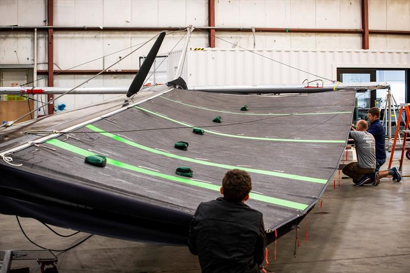 Checking the double-skinned mainsail - American Magic - photo © Amory Ross