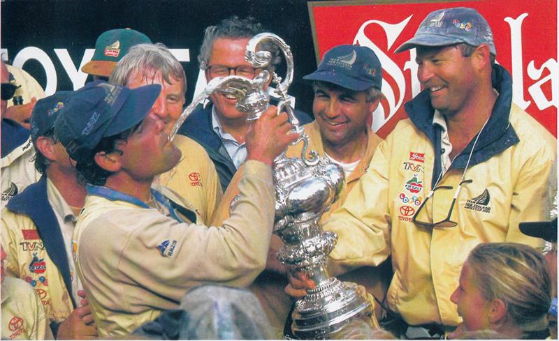 Alan Sefton (obscured) looks on as Russell Coutts celebrates the 1995 America's Cup win, May 13, 1995, San Diego photo copyright Sally Samins taken at San Diego Yacht Club and featuring the ACC class