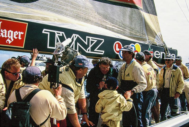 Bruno Trouble (holding champagne) with PJ Montgomery - on Luna Rossa - 2000  Louis Vuitton Cup winners