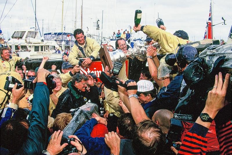 Peter Montgomery in the centre of a very wet media scrum after NZL-32's win in San Diego photo copyright Montgomery archives taken at Royal New Zealand Yacht Squadron and featuring the ACC class