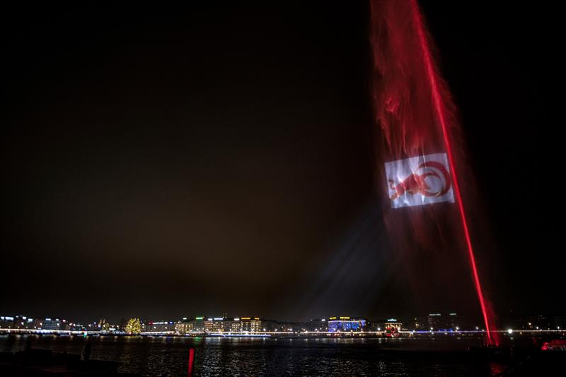 The Alinghi Red Bull Racing logo is seen displayed at the Jet d'eau in Geneva, Switzerland  photo copyright Red Bull Media taken at Société Nautique de Genève and featuring the ACC class