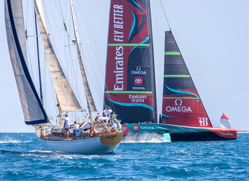 Emirates Team New Zealand's pass through a classic yacht racing regatta off Barcelona photo copyright Hamish Hooper / Emirates Team New Zealand taken at Royal New Zealand Yacht Squadron and featuring the ACC class
