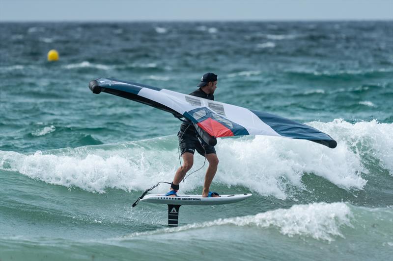 Nathan Outteridge surfing waves during a wing foiling session in Tarifa, Spain photo copyright Beau Outteridge taken at Real Club Náutico de Palma and featuring the  class