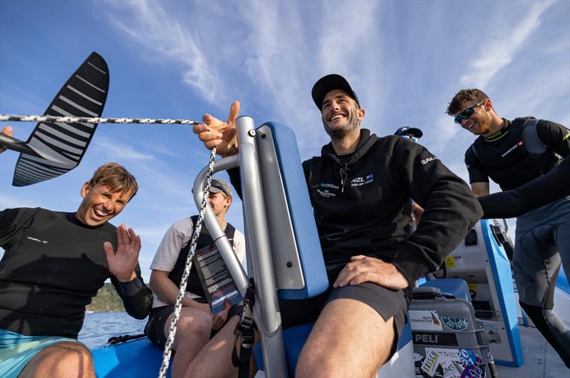 Young sailors in the SailGP Inspire program try out wake foiling with Blair Tuke, Co-CEO and wing trimmer of New Zealand SailGP Team, following a practice session ahead of the Great Britain Sail Grand Prix | Plymouth in Plymouth, England. 29th July photo copyright Felix Diemer/SailGP taken at Royal New Zealand Yacht Squadron and featuring the  class