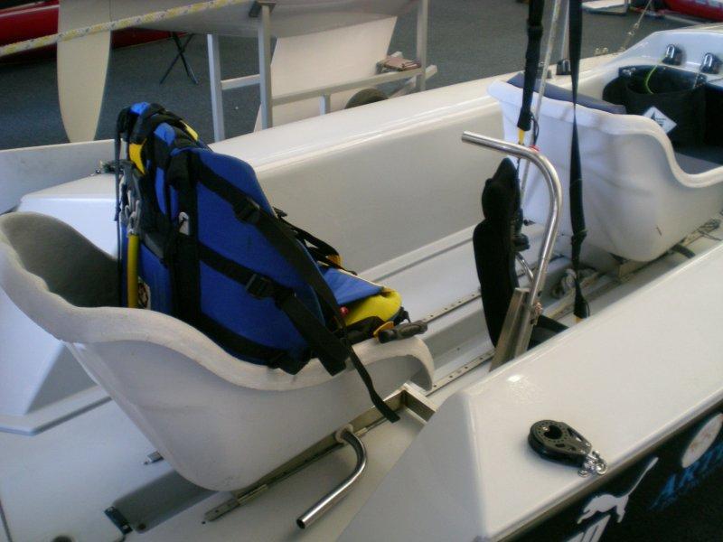 This rear seat has a special harness, and the helm can steer using the metal lever, on this Artemis - photo © Magnus Smith / www.yachtsandyachting.com