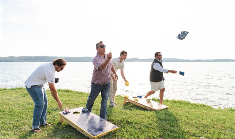 Torch Lake Yacht Club hosted lakeside parties each night, bringing all the sailors together during the 2026 A Scow National Championship photo copyright Hannah Noll taken at Torch Lake Yacht and Country Club and featuring the A Scow class