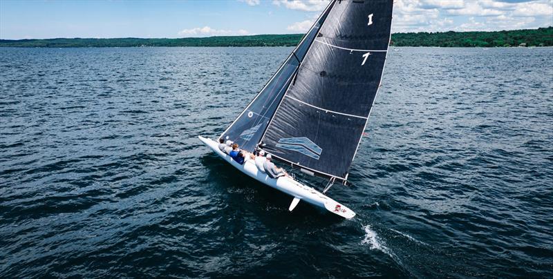 Defending champions I-7 Madcap on their way to a race win and third overall in the 2026 A Scow National Championship - photo © Hannah Noll