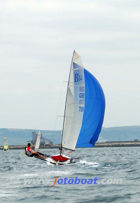 Action from the B14 Europeans at Weymouth photo copyright Steve Bell / www.fotoboat.com taken at Castle Cove Sailing Club and featuring the B14 class