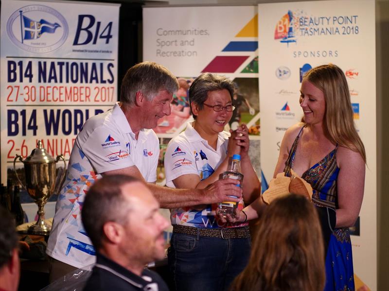 Steve Miller, 1st Handicap receiving the local gin during the B14 Worlds prize giving - photo © Steve Miller