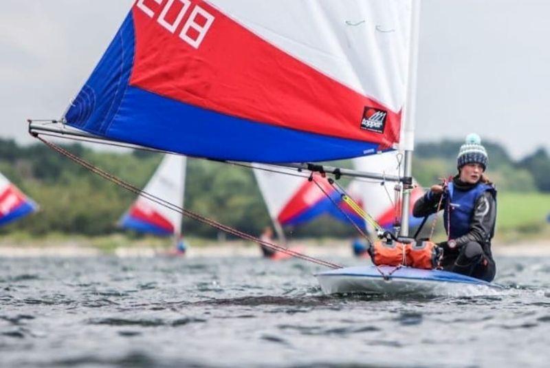 Barton Gear Trialist - Issy Glazebrook, a Topper Squad Sailor - using the new downhaul photo copyright Barton Marine taken at  and featuring the  class