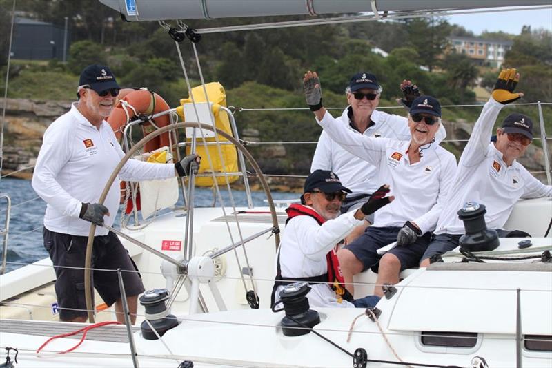 Iago, which is skippered by Rob Yeats, demonstrate just how much everyone gets into the day photo copyright Alex McKinnon Photography taken at  and featuring the Beneteau class