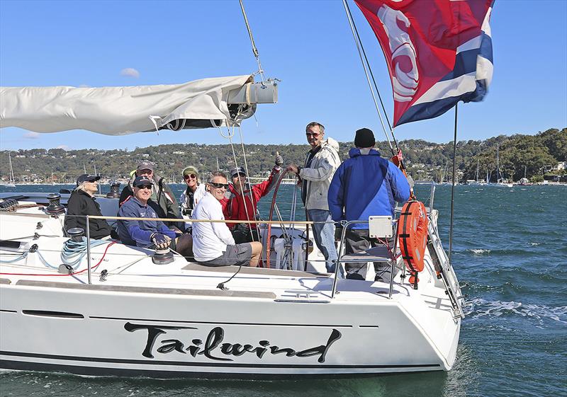 The enthusiastic crew of Tailwind, and that massive Beneteau backstay flag… photo copyright John Curnow taken at Royal Prince Alfred Yacht Club and featuring the Beneteau class