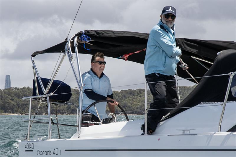 Greg Scarlet helming Knot a Diamond - photo © John Curnow