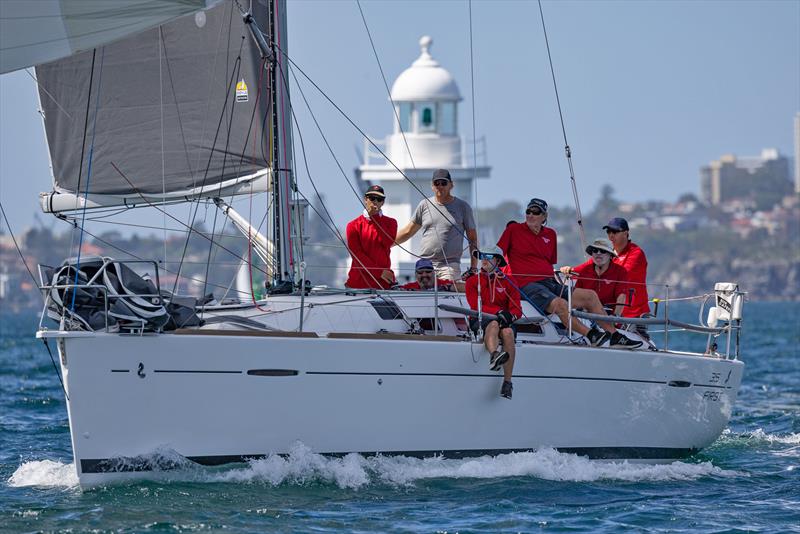 Spinnaker Division winner, Crowded Haus coming back down the Harbour past the Eastern Channel Light - 2025 Beneteau Cup photo copyright John Curnow taken at Cruising Yacht Club of Australia and featuring the Beneteau class