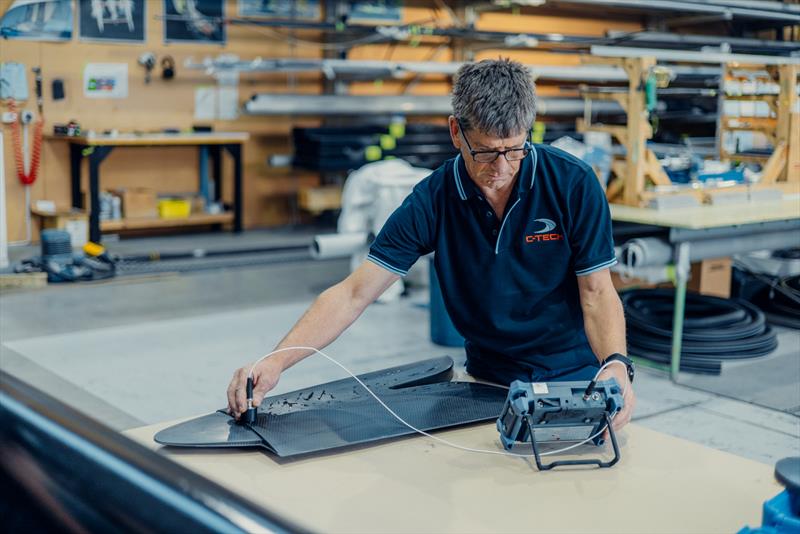 C-Tech founder and top skiff sailor Alex Vallings doing a scanner check on the new foils -- C-Tech build facility - September 2025 - photo © C-Tech