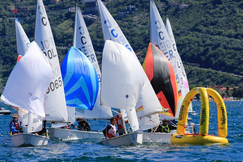 Cadet Worlds 2021 on Lake Garda photo copyright Elena Giolai taken at Fraglia Vela Riva and featuring the Cadet class