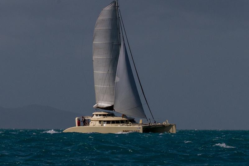 Brian Forrester's Drumbeat cruise comfortably to first place in the Multihull Cruising Division on Day 1 of Vision Surveys Airlie Beach Race Week photo copyright Shirley Wodson taken at Whitsunday Sailing Club and featuring the Catamaran class