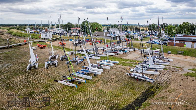 Cats ready to launch during the East Coast Piers Race photo copyright Alex Irwin / www.sportography.tv taken at Marconi Sailing Club and featuring the Catamaran class