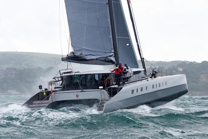 Current Rolex Fastnet Race MOCRA class leader, Adrian Keller's 84ft Nigel Irens-designed racer-cruiser catamaran Allegra photo copyright Rick Tomlinson / www.rick-tomlinson.com taken at Royal Ocean Racing Club and featuring the Catamaran class