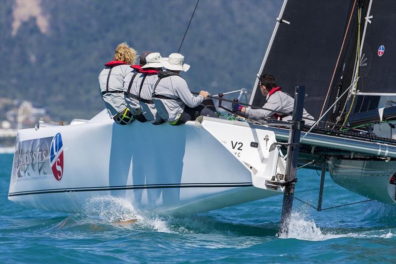 Ullman Sails crew hard at work last year  - 2017 Airlie Beach Race Week  photo copyright Andrea Francolini taken at Whitsunday Sailing Club and featuring the Catamaran class