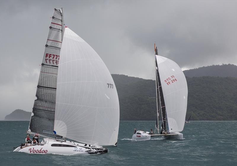 Close battle between Voodoo and Twin Sharks in the Firefly class. Day 2, Cape Panwa Hotel Phuket Raceweek 2019 photo copyright Guy Nowell taken at  and featuring the Catamaran class