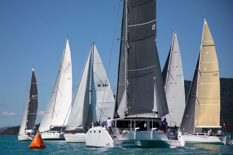 Multihull Mint pushes her way through the monohulls - 2020 Airlie Beach Race Week, final day photo copyright Shirley Wodson / ABRW taken at Whitsunday Sailing Club and featuring the Catamaran class