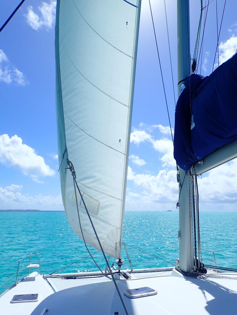 Two Drifters sailing inside a reaaf in the Society Islands photo copyright Jenevora Swann taken at  and featuring the Catamaran class