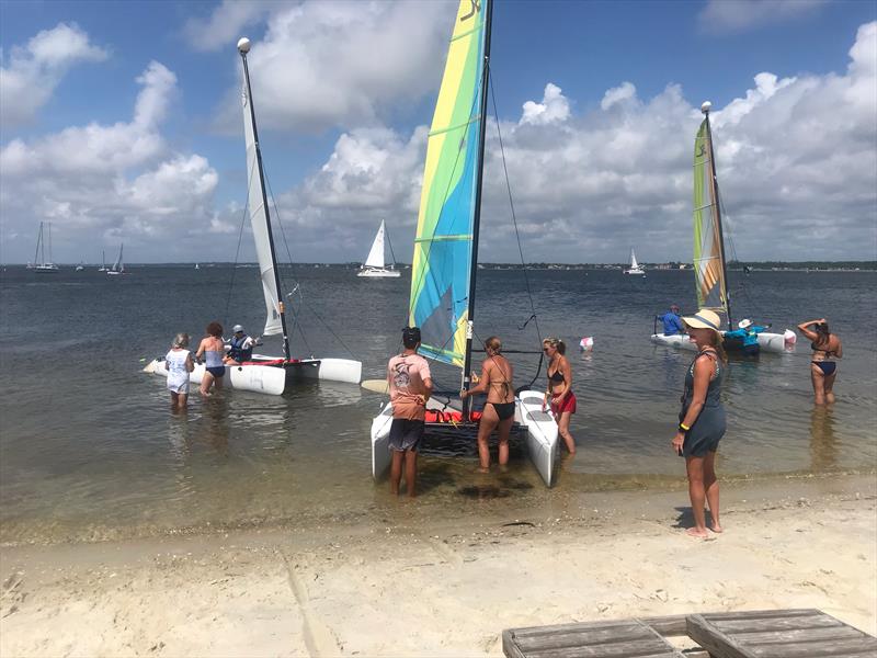 Pre-racing action at the Juana Good Time Regatta photo copyright Juana Good Time Regatta taken at New York Yacht Club and featuring the Catamaran class