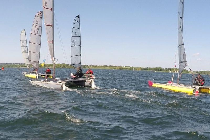 Jockeying before the start at the Rutland Cat Open photo copyright Syd Gage taken at Rutland Sailing Club and featuring the Catapult class