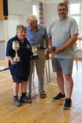 Overall winner Val Millward with her trophies alongside Solway Yacht Club Sailing Secretary and Race Officer, John Broadbent, together with Club Commodore, Scott McColm during the Challenger Scottish Championship