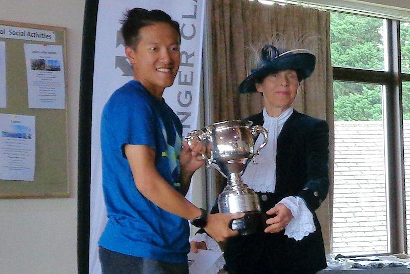Chi Chian Wu being presented with the Curtis Cup as overall winner of the UK Open Challenger Championships 2023 at Rutland photo copyright Marion Edwards taken at Rutland Sailing Club and featuring the Challenger class