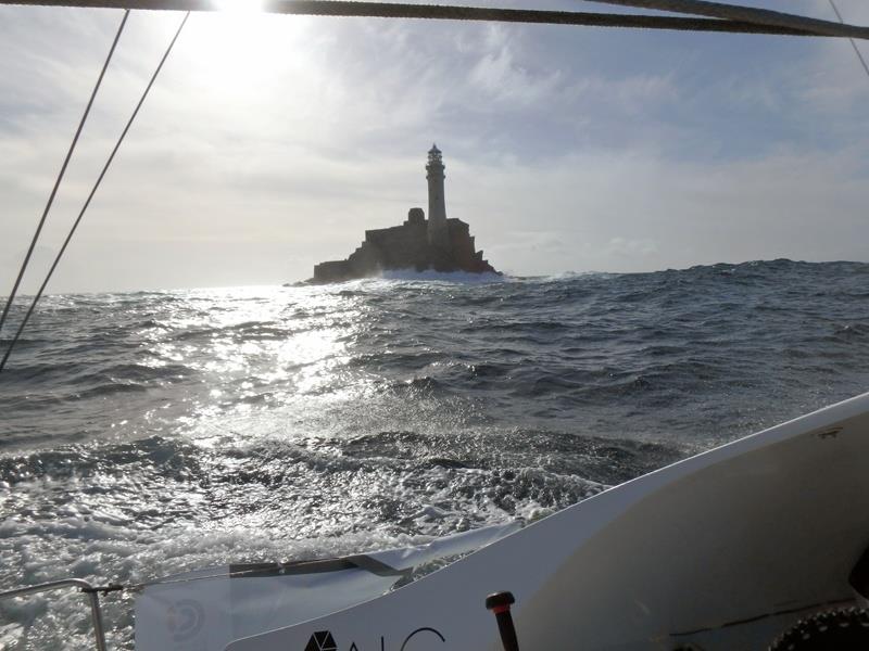 Phil Sharp rounding the Fastnet Rock in 2015 photo copyright Phil Sharp taken at Royal Ocean Racing Club and featuring the Class 40 class