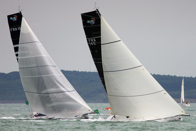 Class 40s pass Hurst Castle in the 2019 Rolex Fastnet Race - photo © Mark Jardine