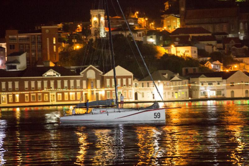 Class40 RED makes her way into Camper & Nicholsons Port Louis Marina after finishing the race and taking Class40 victory - photo © RORC / Arthur Daniel