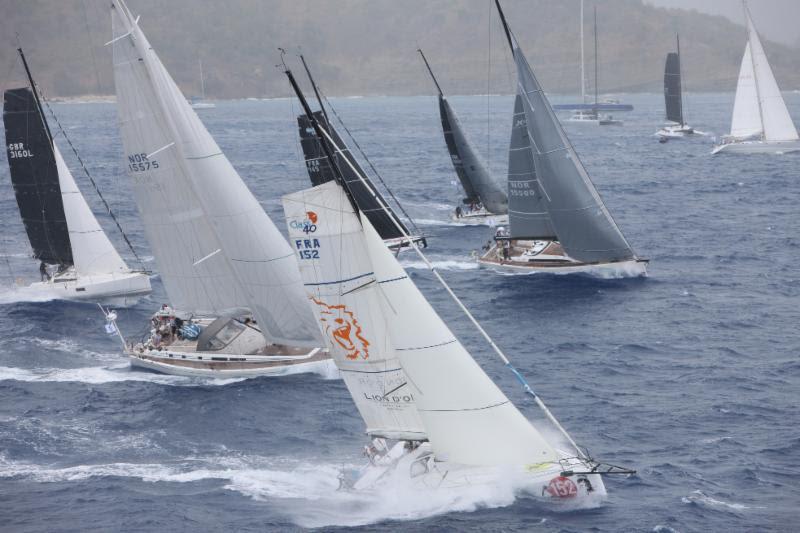 The Class40 and IRC 1 fleet set off at 1140 AST in squally conditions photo copyright Tim Wright / Photoaction.com taken at Royal Ocean Racing Club and featuring the Class 40 class